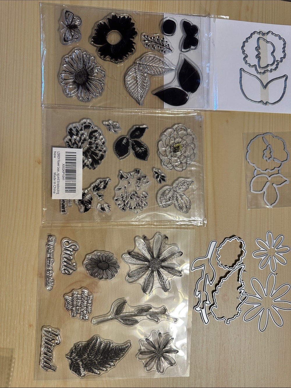 Multiple Sets of Floral Clear Stamps and Dies.